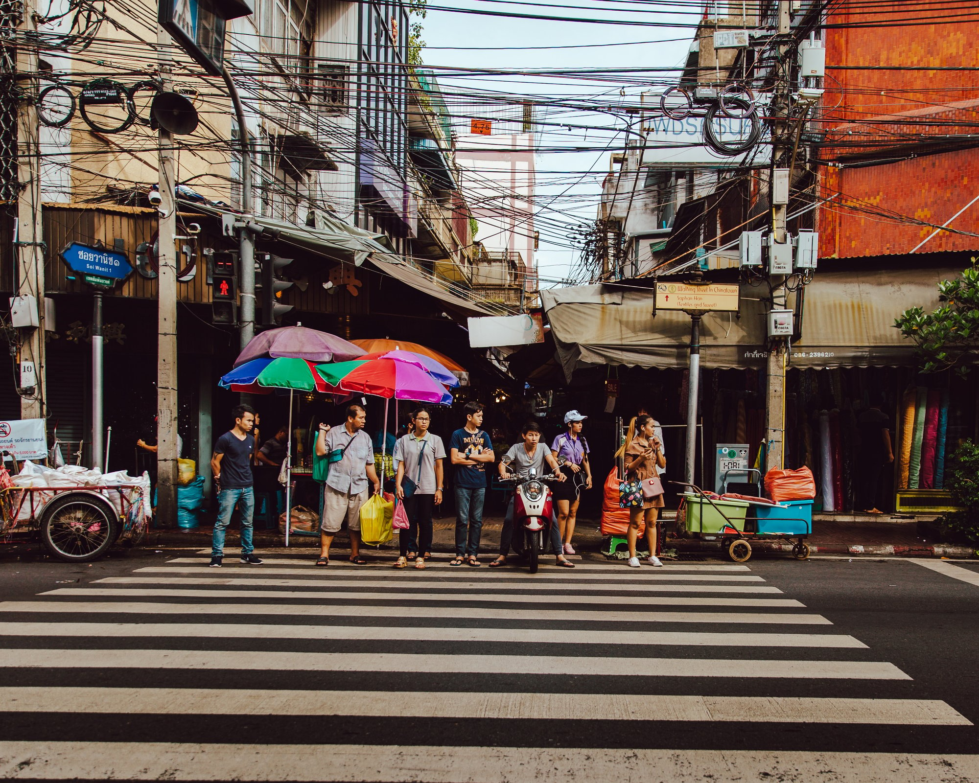 People crossing street in Thailand